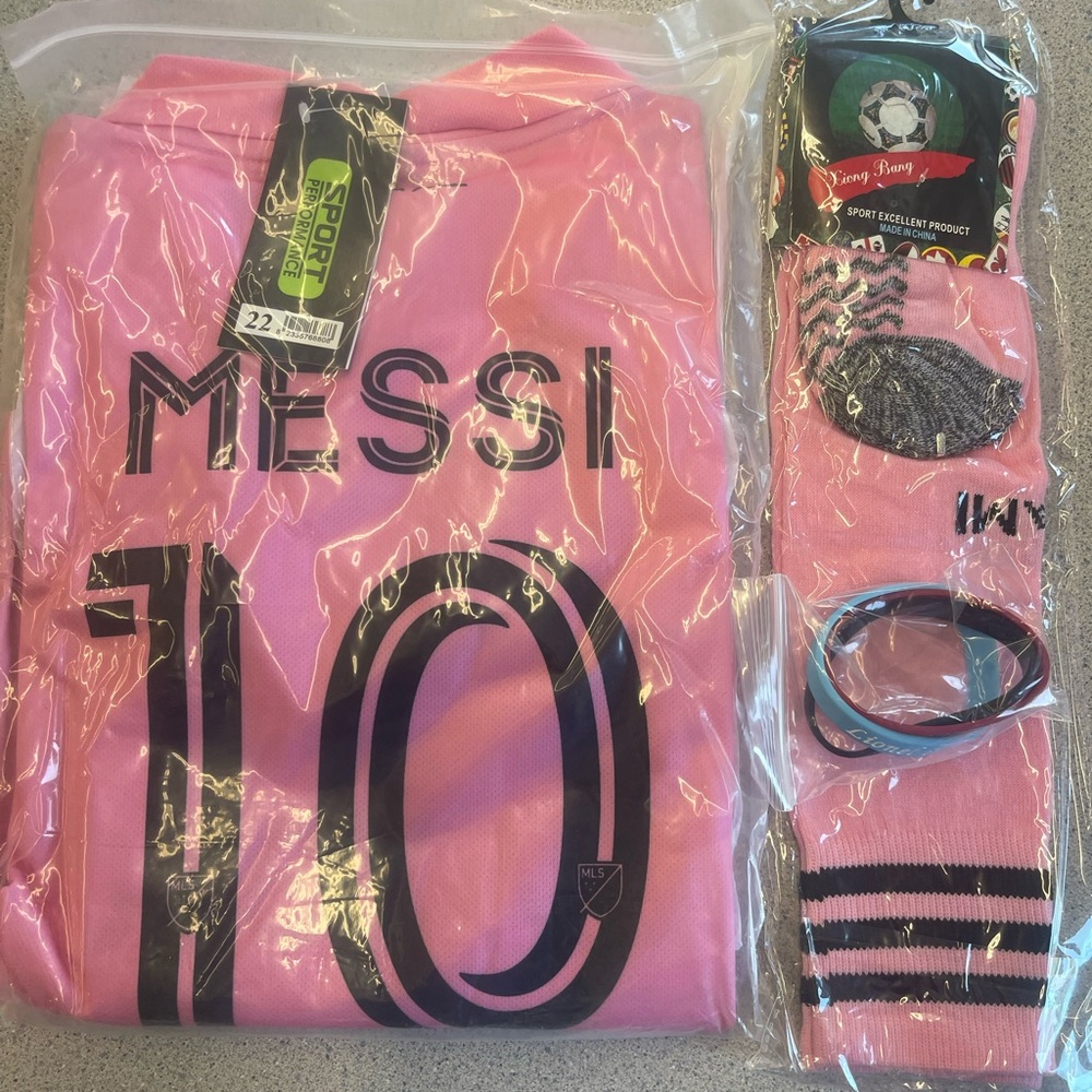 NWT LIonel Messi Jersey set. Shirt, shorts, socks, bracelets